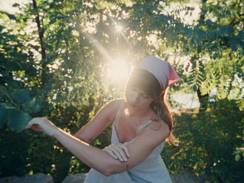 Sun flaring through the trees, from Thank You, Summer, an Aesop concept film by Studio Propel