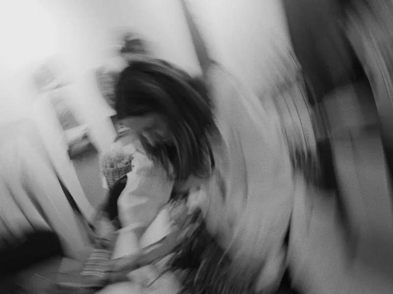 A black and white blur of motion in the studio, from Art and Motherhood by Studio Propel