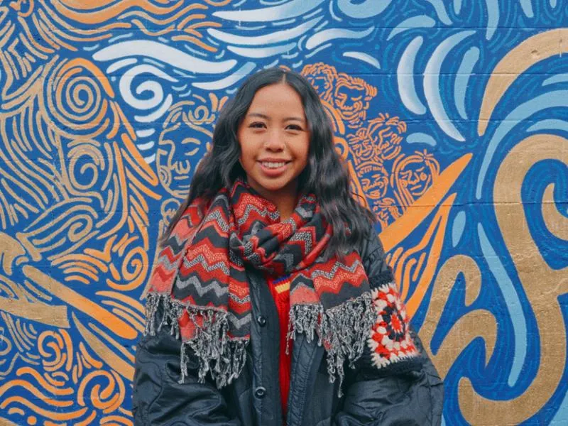Mar Cortez in front of a mural, from Imposter Syndrome by Studio Propel