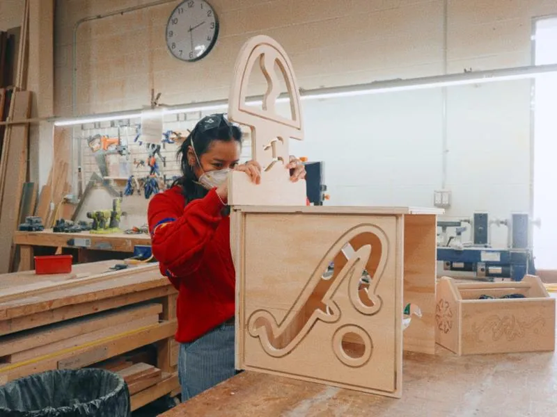 Mar Cortez building a piece in the woodshop, from Imposter Syndrome by Studio Propel