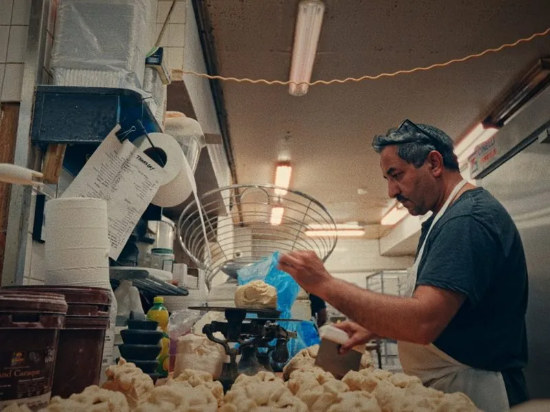 Weighing dough on an old bakery scale, from Before Thanksgiving, a Studio Propel short film