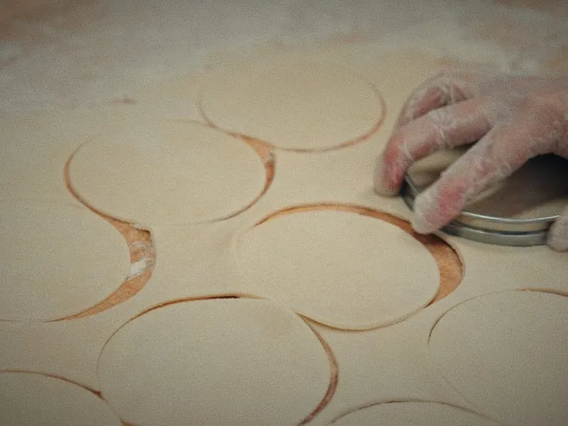 Cutting rounds of pastry with a metal ring, from Before Thanksgiving, a Studio Propel short film