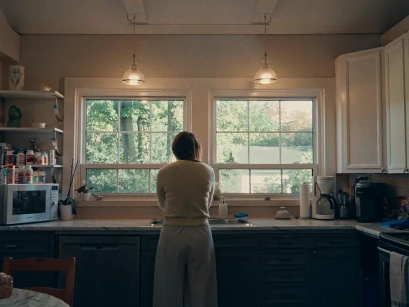 At the kitchen sink, morning light through the windows, from First Day, a Studio Propel short film