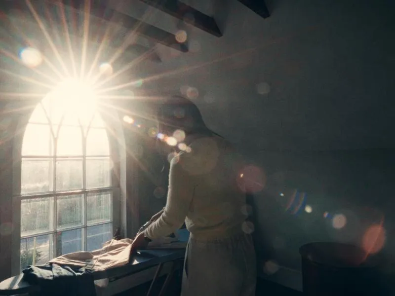 Ironing a small shirt in the morning sun, from First Day, a Studio Propel short film