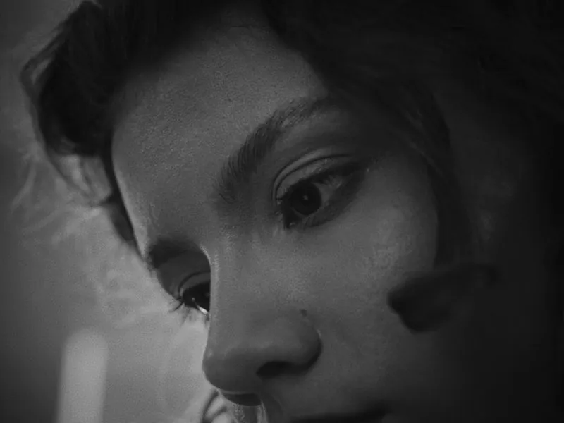 A close look, in black and white, lost in thought, from Curiouser, a Rakuten Kobo concept film by Studio Propel