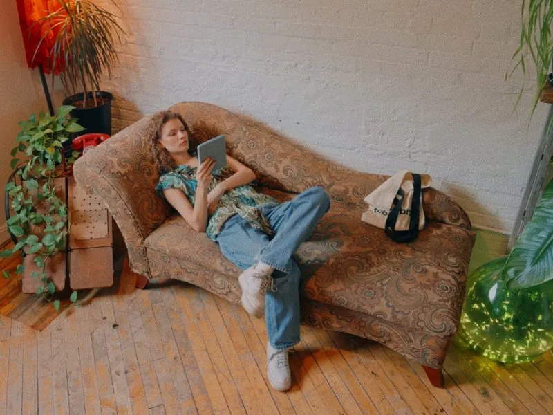 Reading on a vintage chaise, seen from above, from Curiouser, a Rakuten Kobo concept film by Studio Propel